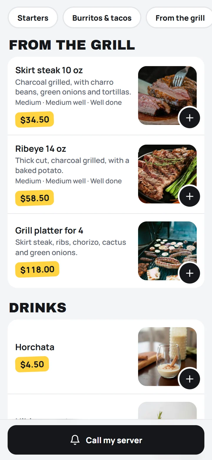 A restaurant’s menu on a guest’s phone: skirt steak, rib eye and mixed grill with their photos and prices.